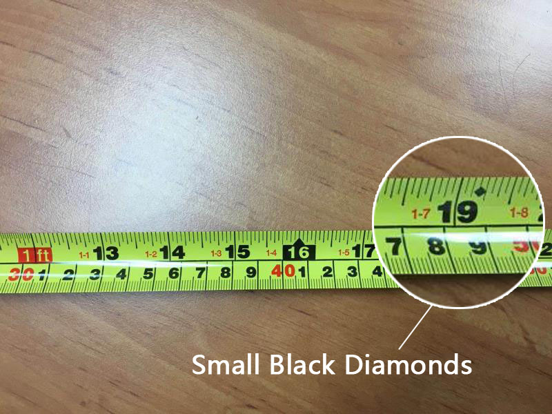 What Are the Black Diamonds on a Tape Measure For